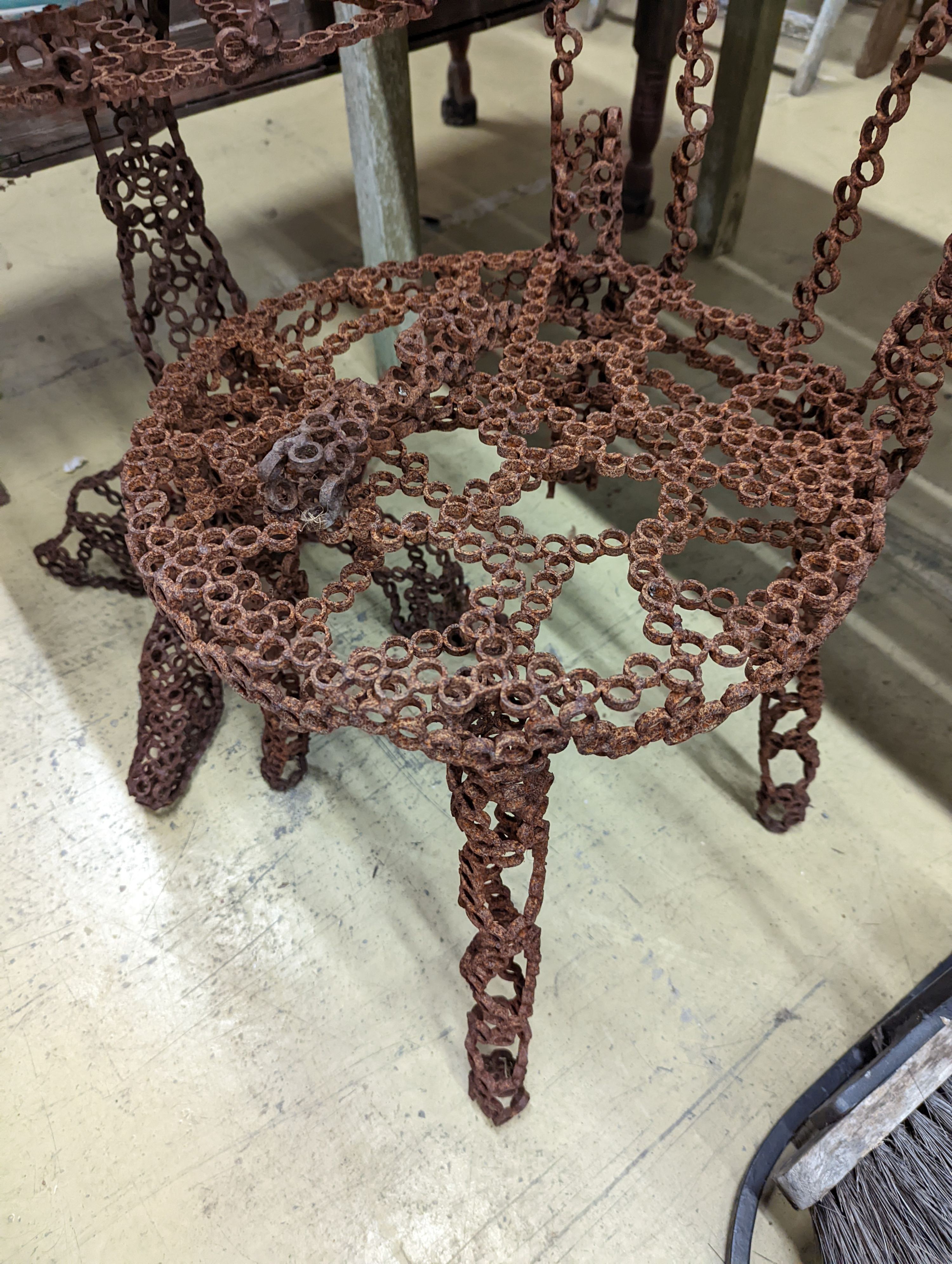 A reclaimed metal table and chair (chair a.f.) table measurements, D-54cm, H-66cm.